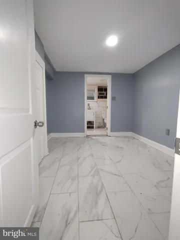 a bathroom with a sink and a shower
