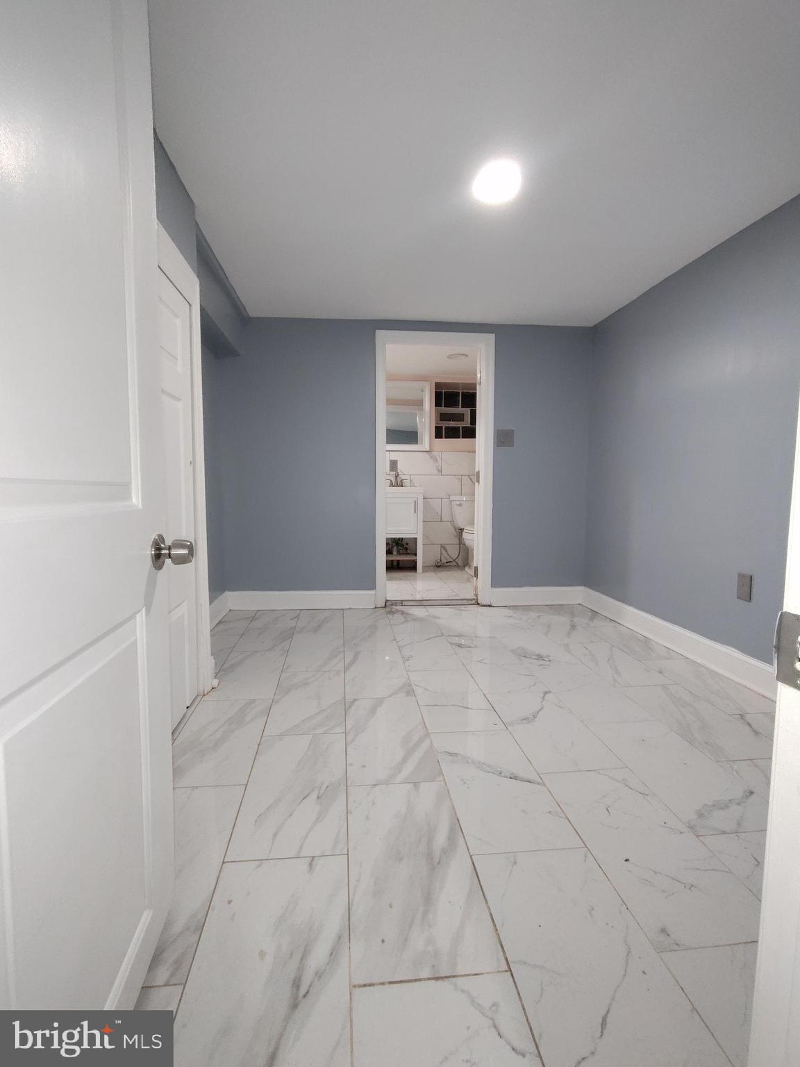 232 Copley Road Upper Darby, PA 19082 - Photo 18 of 21 a view of empty room with a fireplace