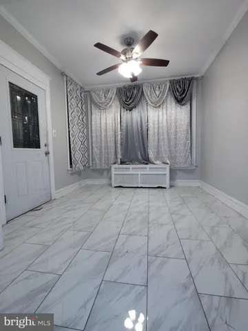 a view of entryway and hall with a window