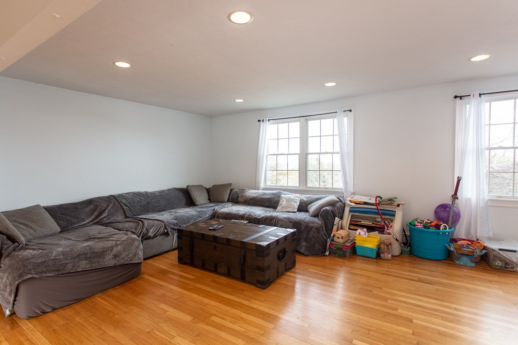 2 Desmond Road Bourne, MA 02561 - Photo 11 of 26 a living room with furniture window and a wooden floor