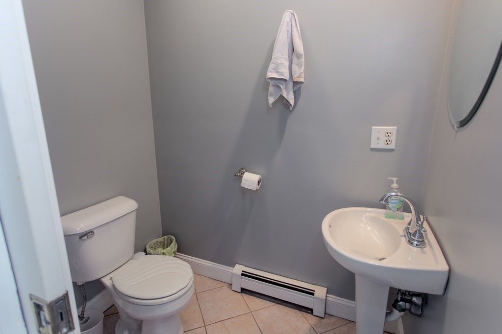 2 Desmond Road Bourne, MA 02561 - Photo 13 of 26 a bathroom with a sink toilet and a mirror