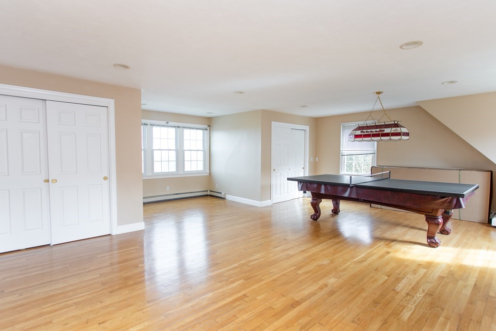 2 Desmond Road Bourne, MA 02561 - Photo 16 of 26 a living room with furniture and a wooden floor