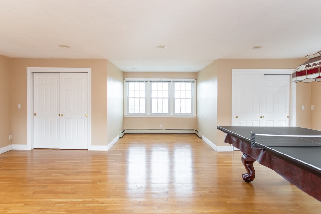 2 Desmond Road Bourne, MA 02561 - Photo 17 of 26 a view of an empty room with window and wooden floor
