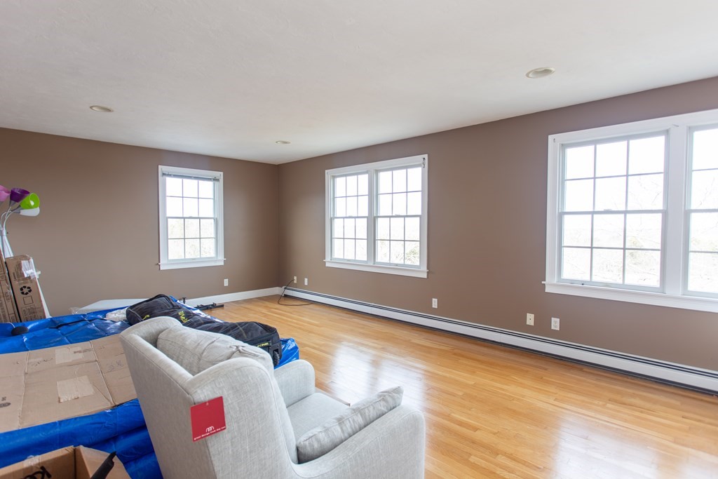 2 Desmond Road Bourne, MA 02561 - Photo 18 of 26 a bedroom with a bed and a window
