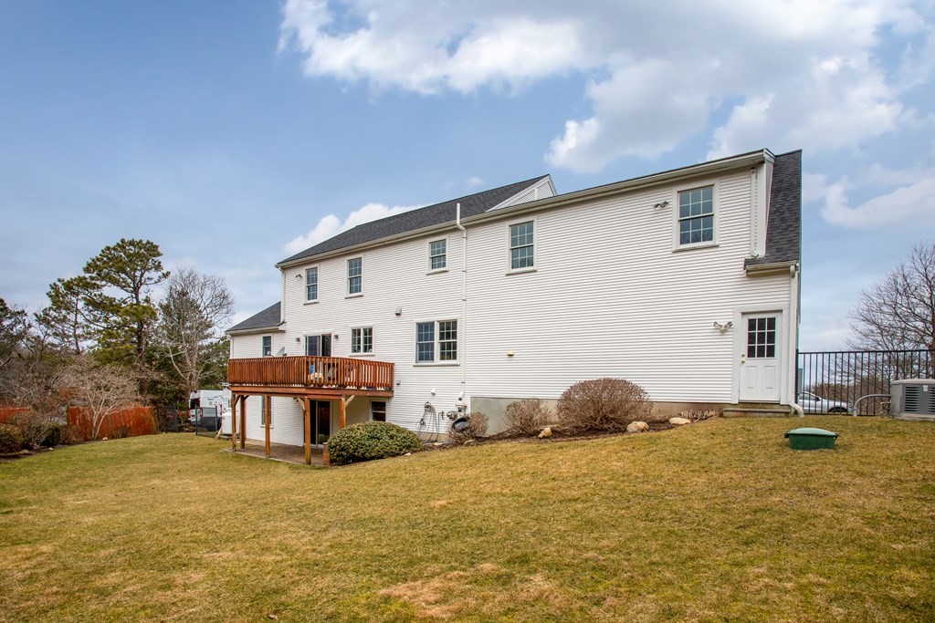 2 Desmond Road Bourne, MA 02561 - Photo 3 of 26 a house view with a garden space
