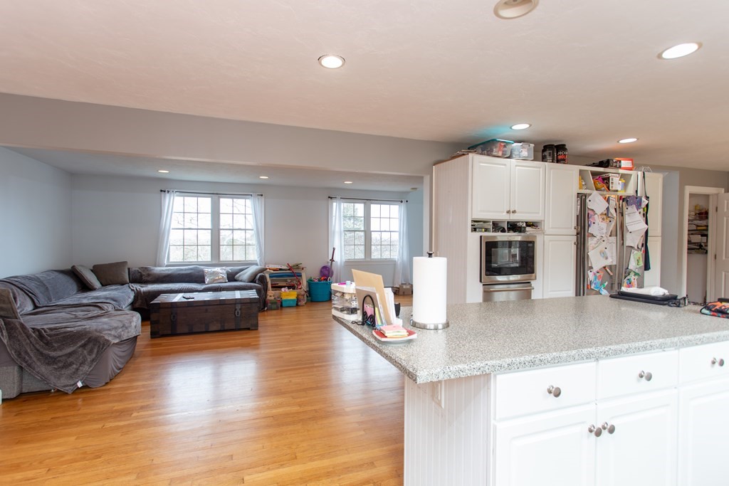 2 Desmond Road Bourne, MA 02561 - Photo 7 of 26 a living room with furniture and a wooden floor
