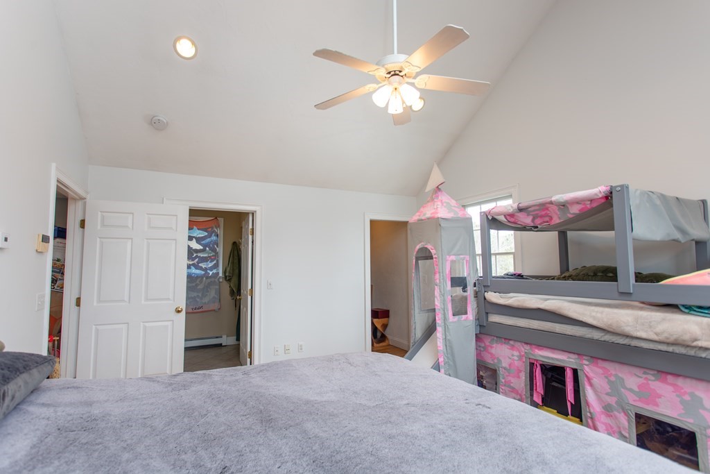 2 Desmond Road Bourne, MA 02561 - Photo 9 of 26 a view of a bedroom with bed and cabinet