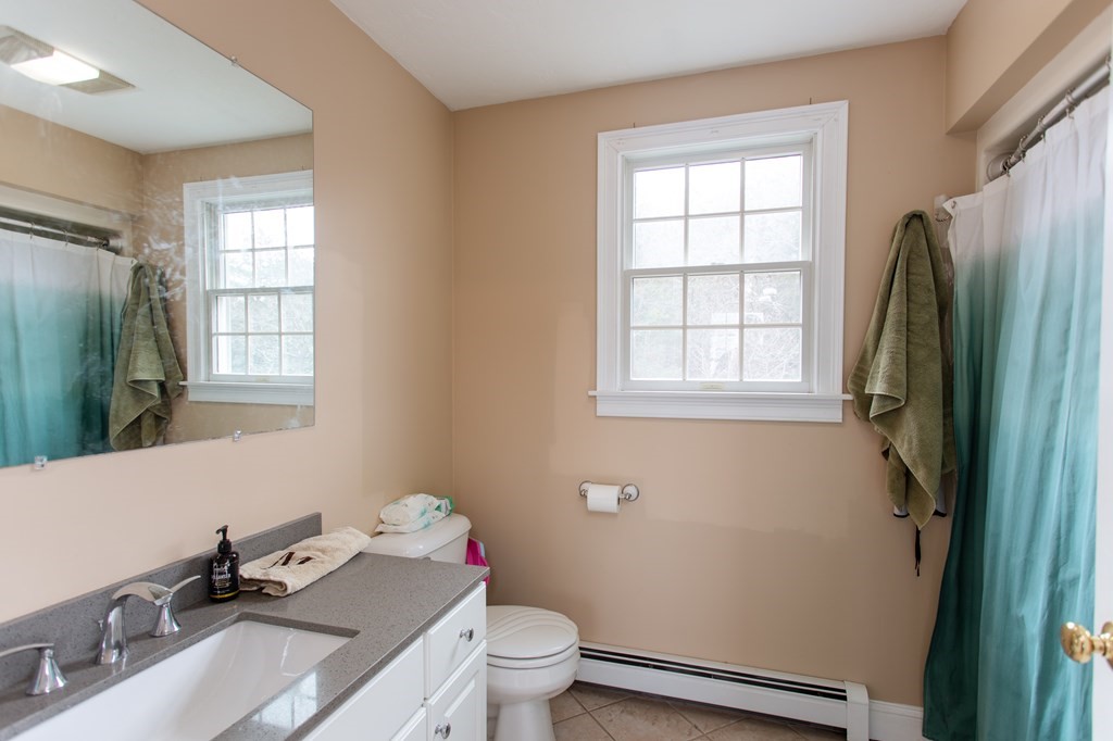 2 Desmond Road Bourne, MA 02561 - Photo 10 of 26 a bathroom with a sink toilet and window