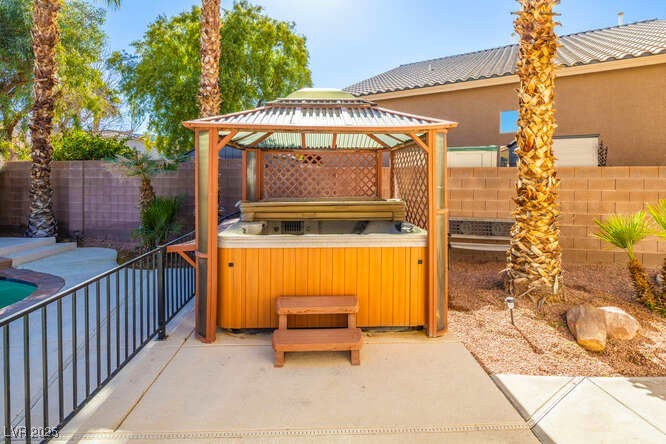 284 Pointe Ranier Avenue Henderson, NV 89012 - Photo 34 of 39 Enjoy swimming, then go soak in this spa for more relaxation!