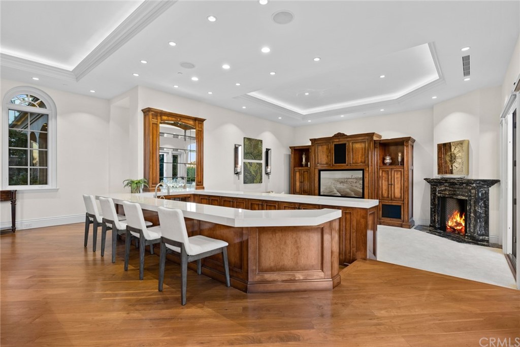 3 Burning Tree Circle Newport Beach, CA 92660 - Photo 13 of 65 a view of a dining room with furniture window and wooden floor