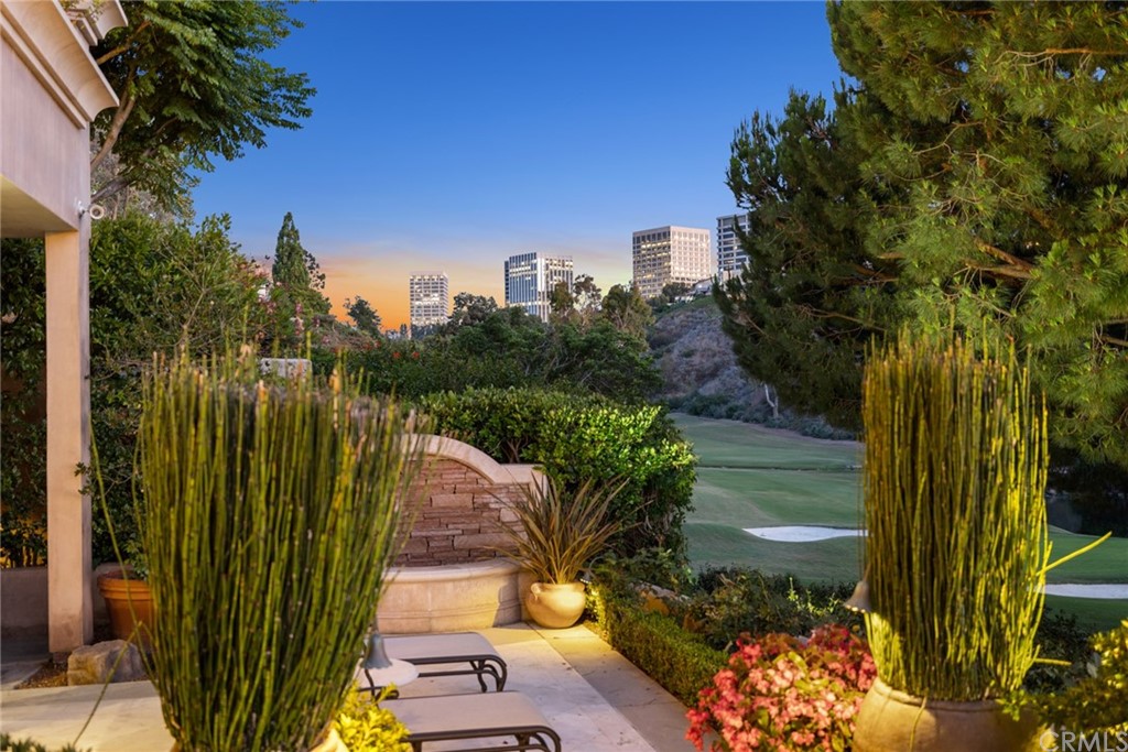 3 Burning Tree Circle Newport Beach, CA 92660 - Photo 26 of 65 a view of a backyard