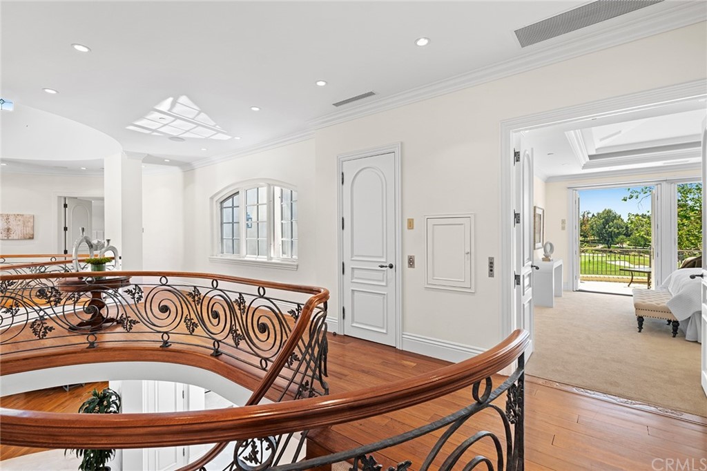 3 Burning Tree Circle Newport Beach, CA 92660 - Photo 33 of 65 a view of a livingroom with furniture window and wooden floor