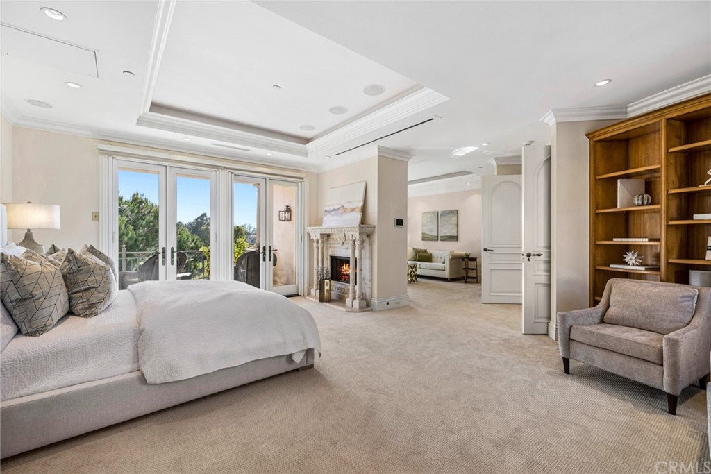 3 Burning Tree Circle Newport Beach, CA 92660 - Photo 35 of 65 a living room with furniture and large window