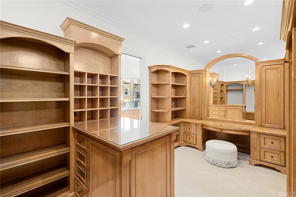 3 Burning Tree Circle Newport Beach, CA 92660 - Photo 40 of 65 a kitchen with a refrigerator and a sink