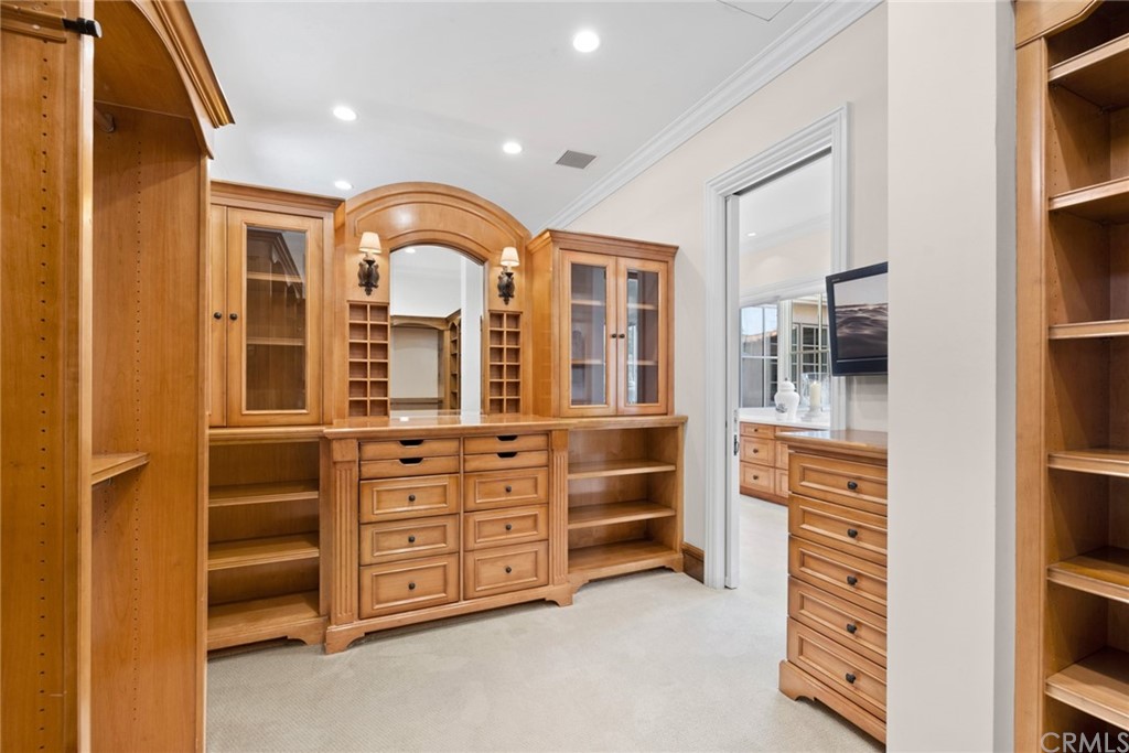 3 Burning Tree Circle Newport Beach, CA 92660 - Photo 41 of 65 a view of living room with cabinets
