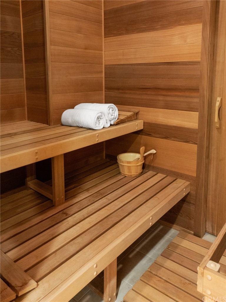 3 Burning Tree Circle Newport Beach, CA 92660 - Photo 53 of 65 a bathroom with a sink and a mirror