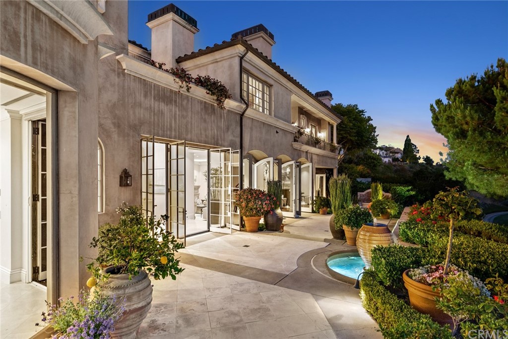 3 Burning Tree Circle Newport Beach, CA 92660 - Photo 60 of 65 a view of a building with sitting area