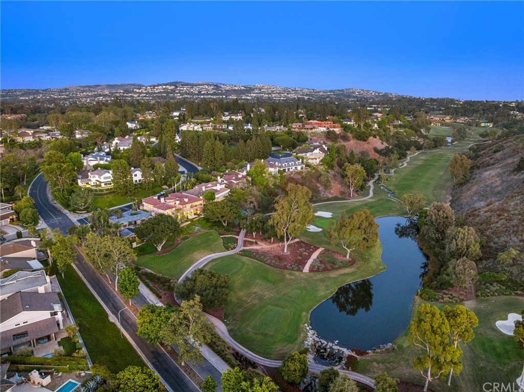 3 Burning Tree Circle Newport Beach, CA 92660 - Photo 65 of 65 an aerial view of residential houses with outdoor space and river