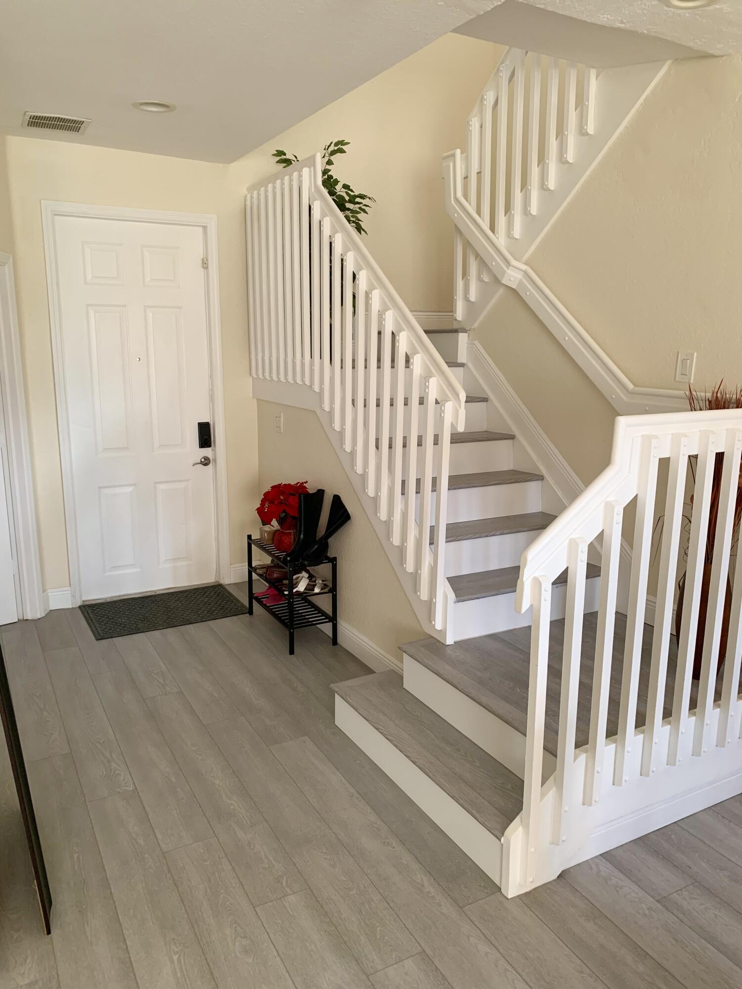 2007 Nassau Drive Riviera Beach, FL 33404 - Photo 3 of 13 a view of entryway and hall with wooden floor