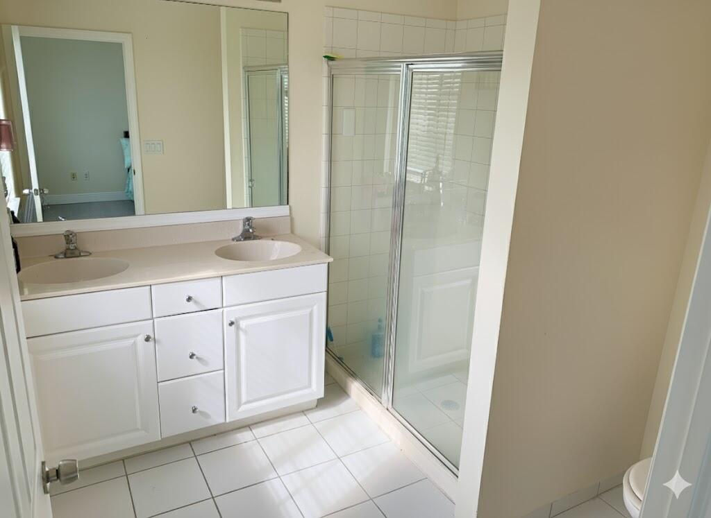 2007 Nassau Drive Riviera Beach, FL 33404 - Photo 8 of 13 a bathroom with a sink and a mirror
