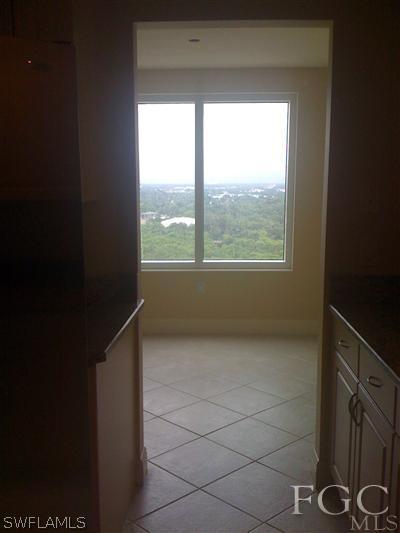 2743 First Street, Unit 1906 Fort Myers, FL 33916 - Photo 3 of 6 a view of an empty room and a window