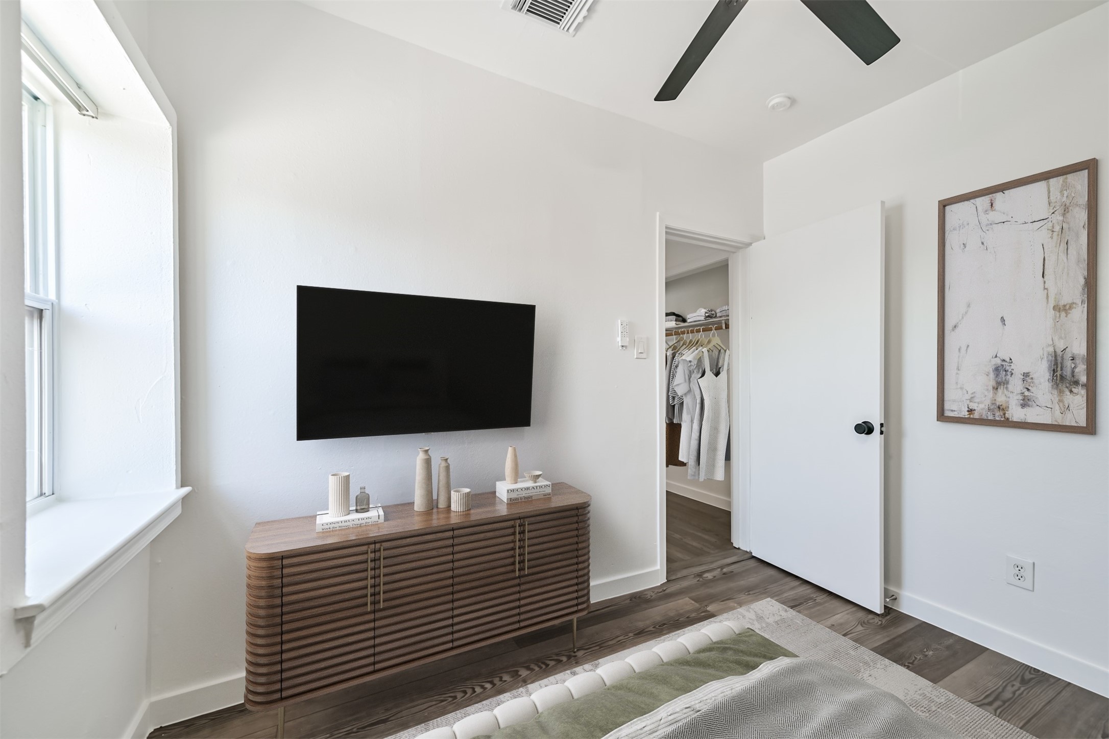 415 Fairview Street, Unit 9 Houston, TX 77006 - Photo 12 of 15 *Virtually staged* Bedroom with large window, updated fan with light fixture.