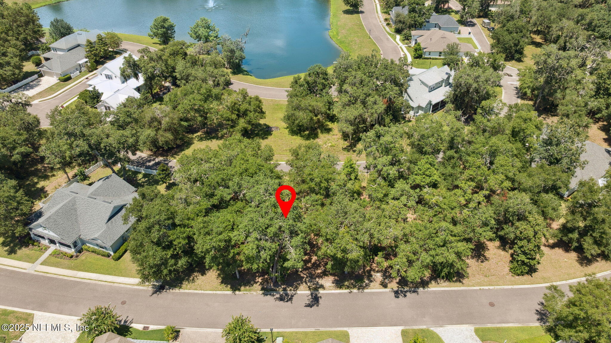 29155 Grandview Manor Yulee, FL 32097 - Photo 7 of 45 an aerial view of residential house with green space and trees all around