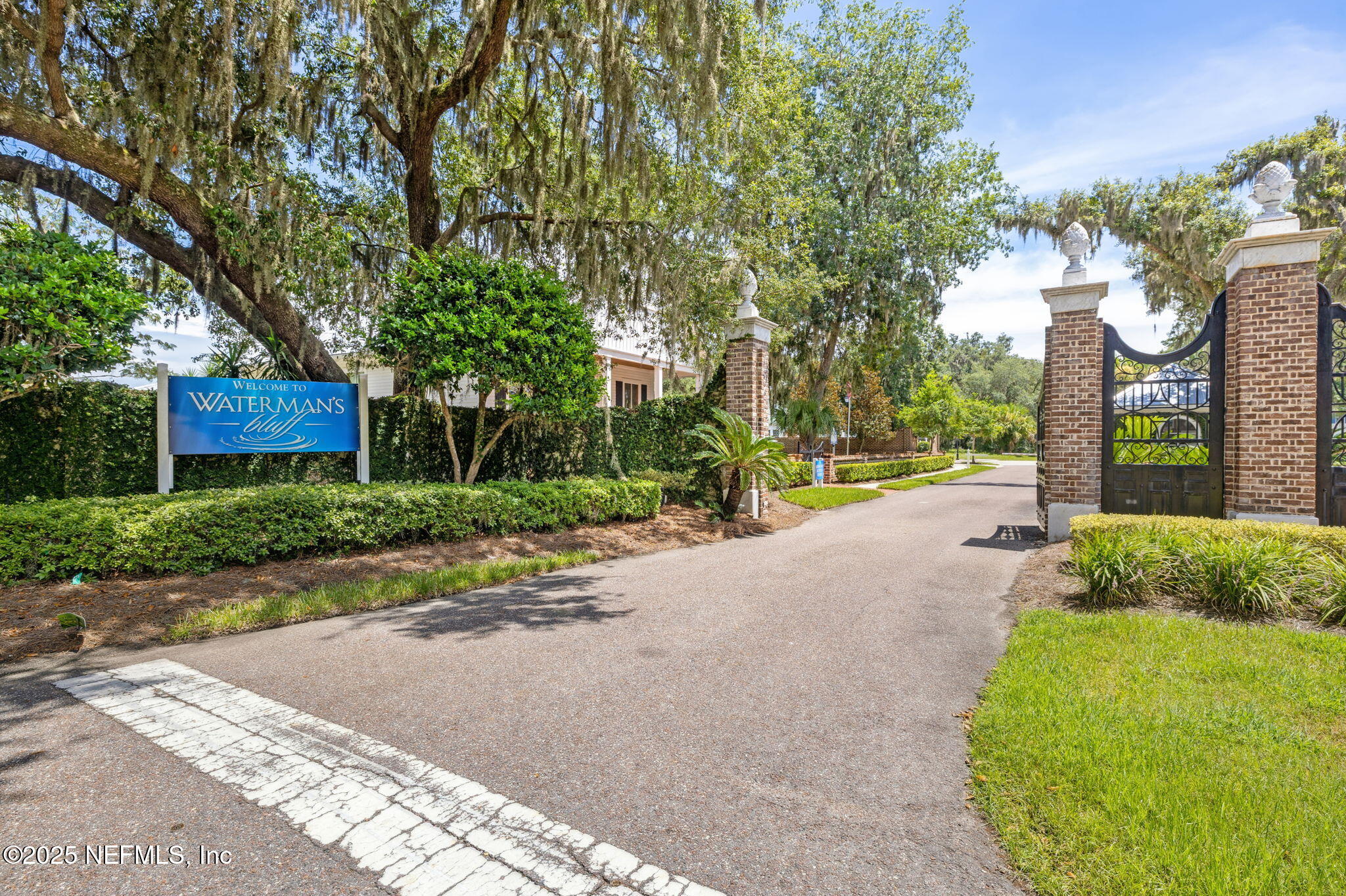 29155 Grandview Manor Yulee, FL 32097 - Photo 9 of 45 a view of a street with a building and a street sign