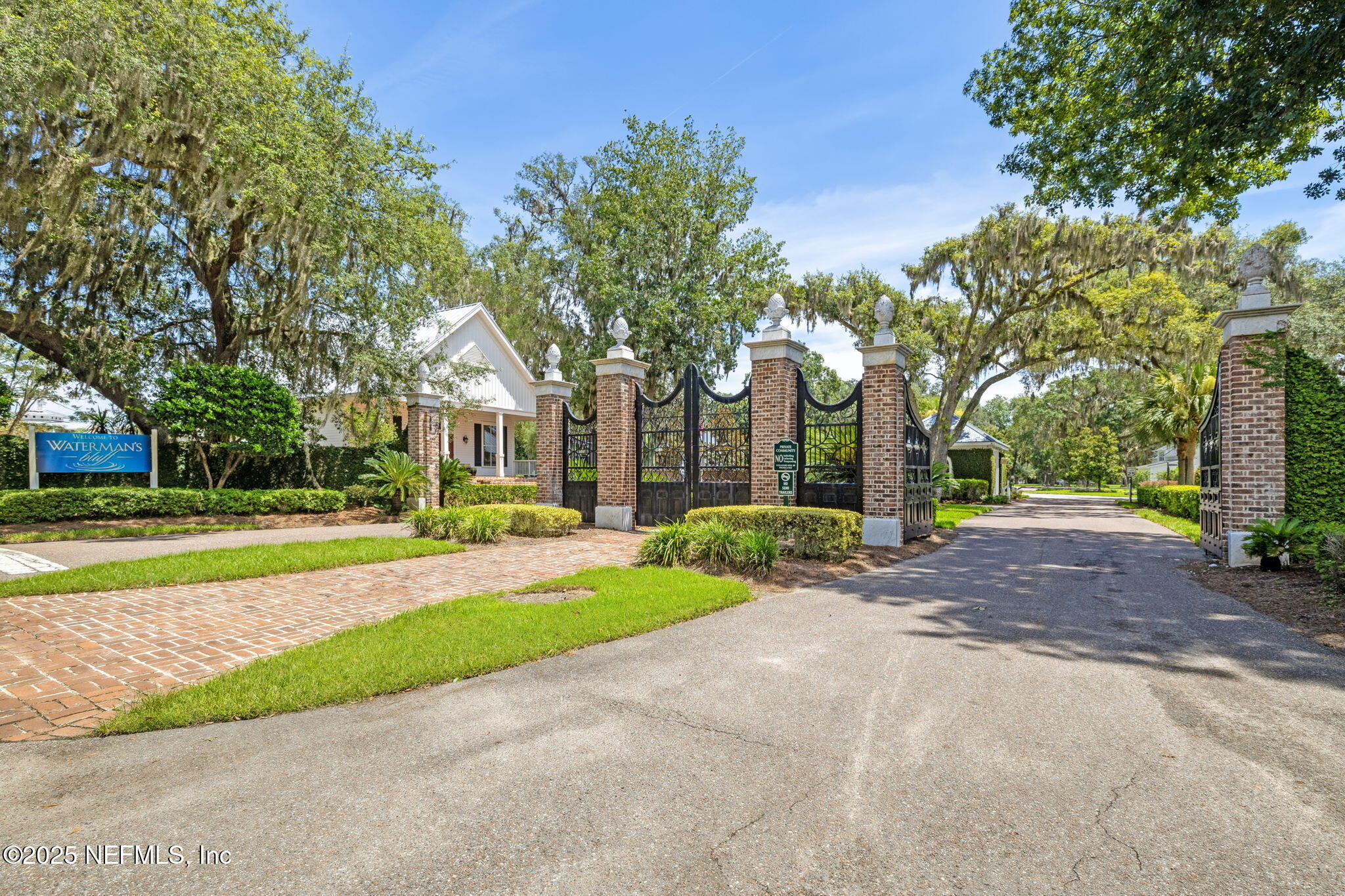 29155 Grandview Manor Yulee, FL 32097 - Photo 10 of 45 a view of a house with a big yard and large trees