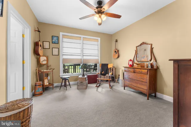 a kitchen with stainless steel appliances granite countertop a refrigerator a sink dishwasher a stove with wooden floor and cabinets