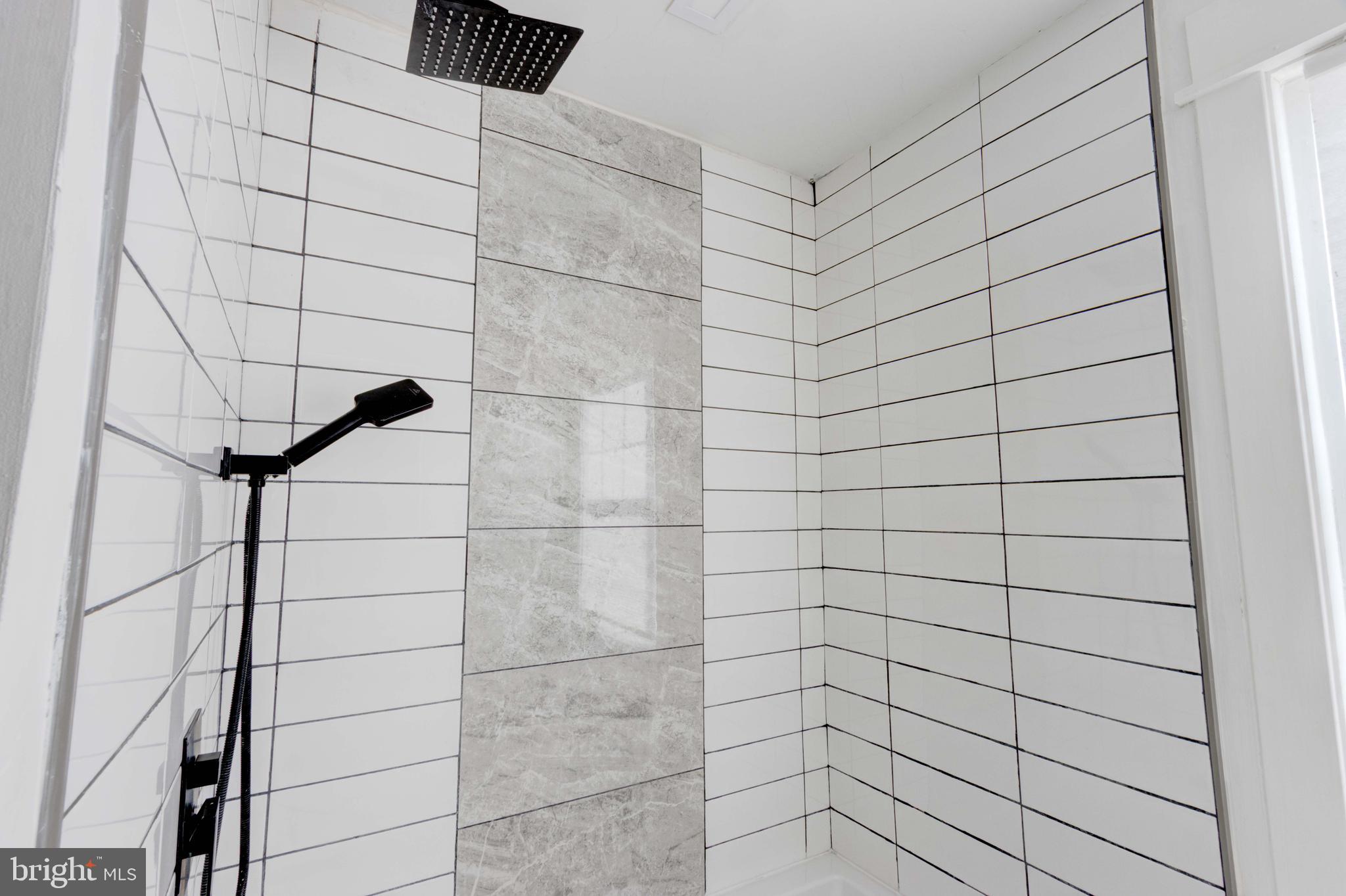 127 Cherrydell Road Catonsville, MD 21228 - Photo 13 of 24 a bathroom with a shower