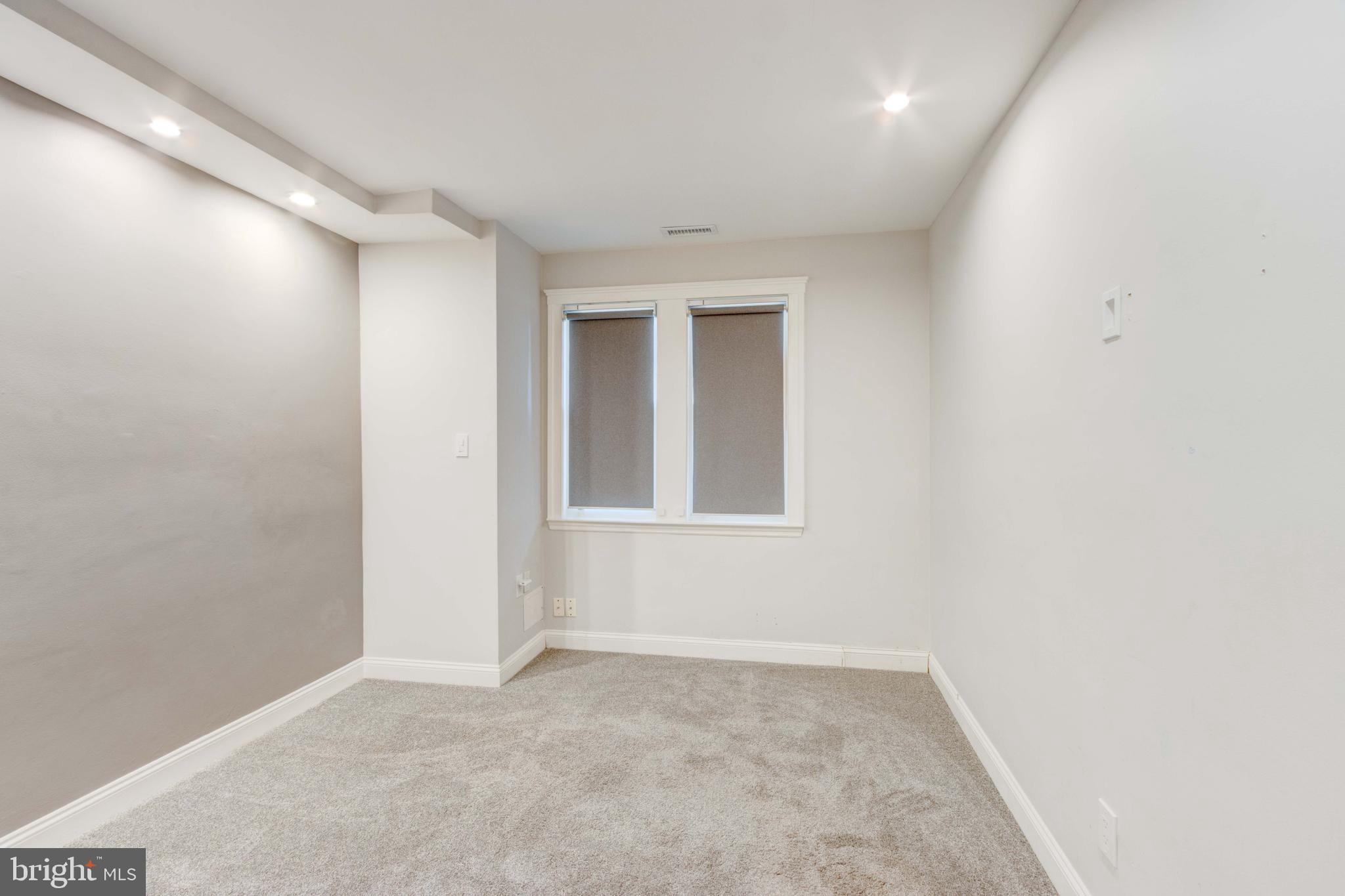 127 Cherrydell Road Catonsville, MD 21228 - Photo 17 of 24 a view of an empty room with a window