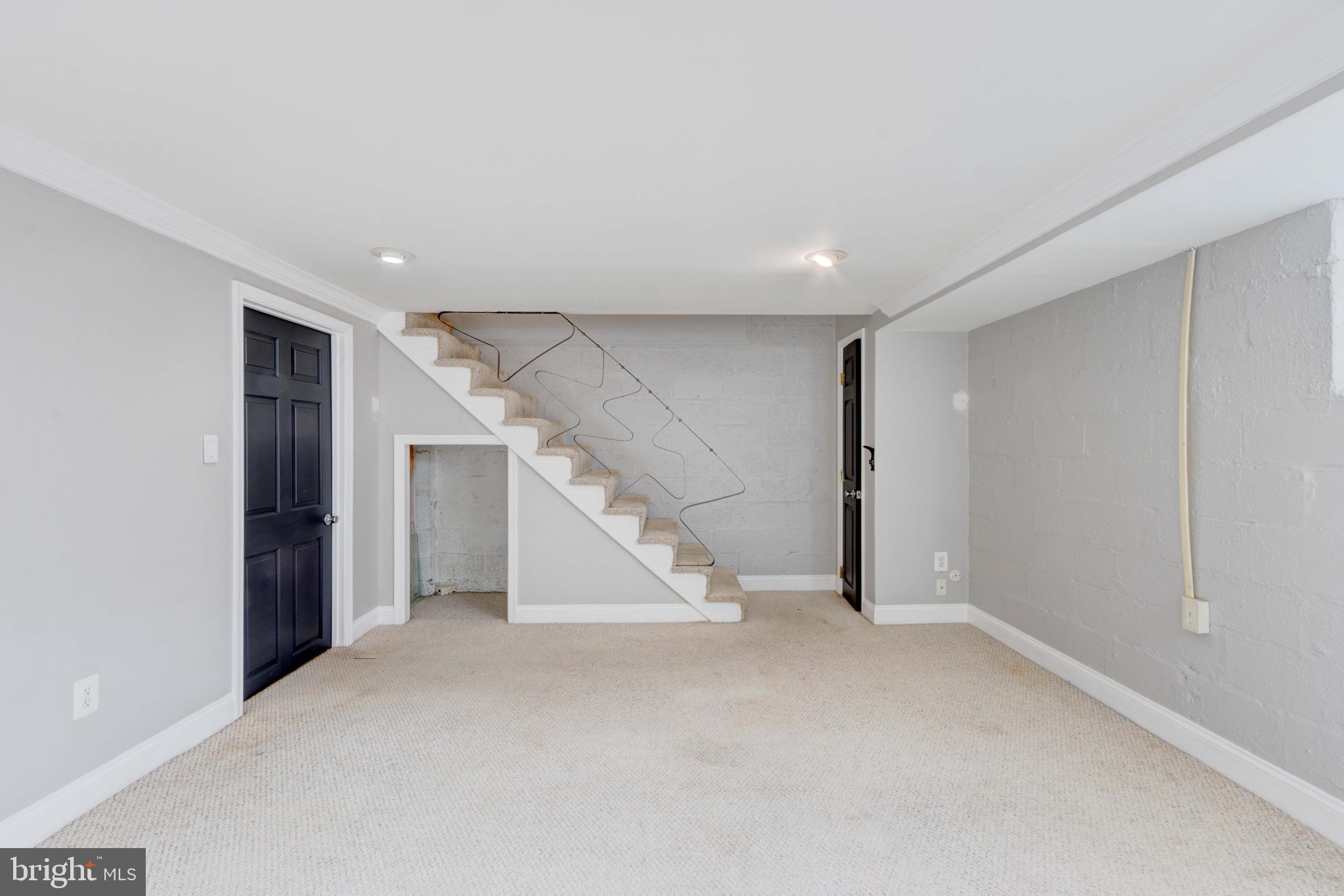 127 Cherrydell Road Catonsville, MD 21228 - Photo 18 of 24 a view of an empty room with stairs