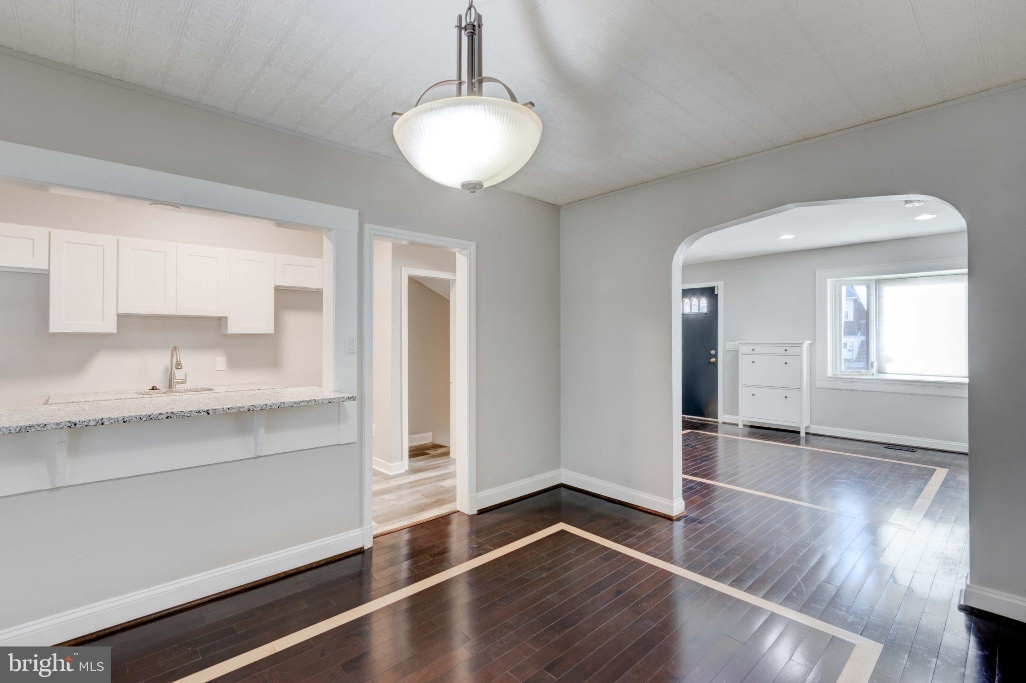 127 Cherrydell Road Catonsville, MD 21228 - Photo 6 of 24 a room with wooden floor and window