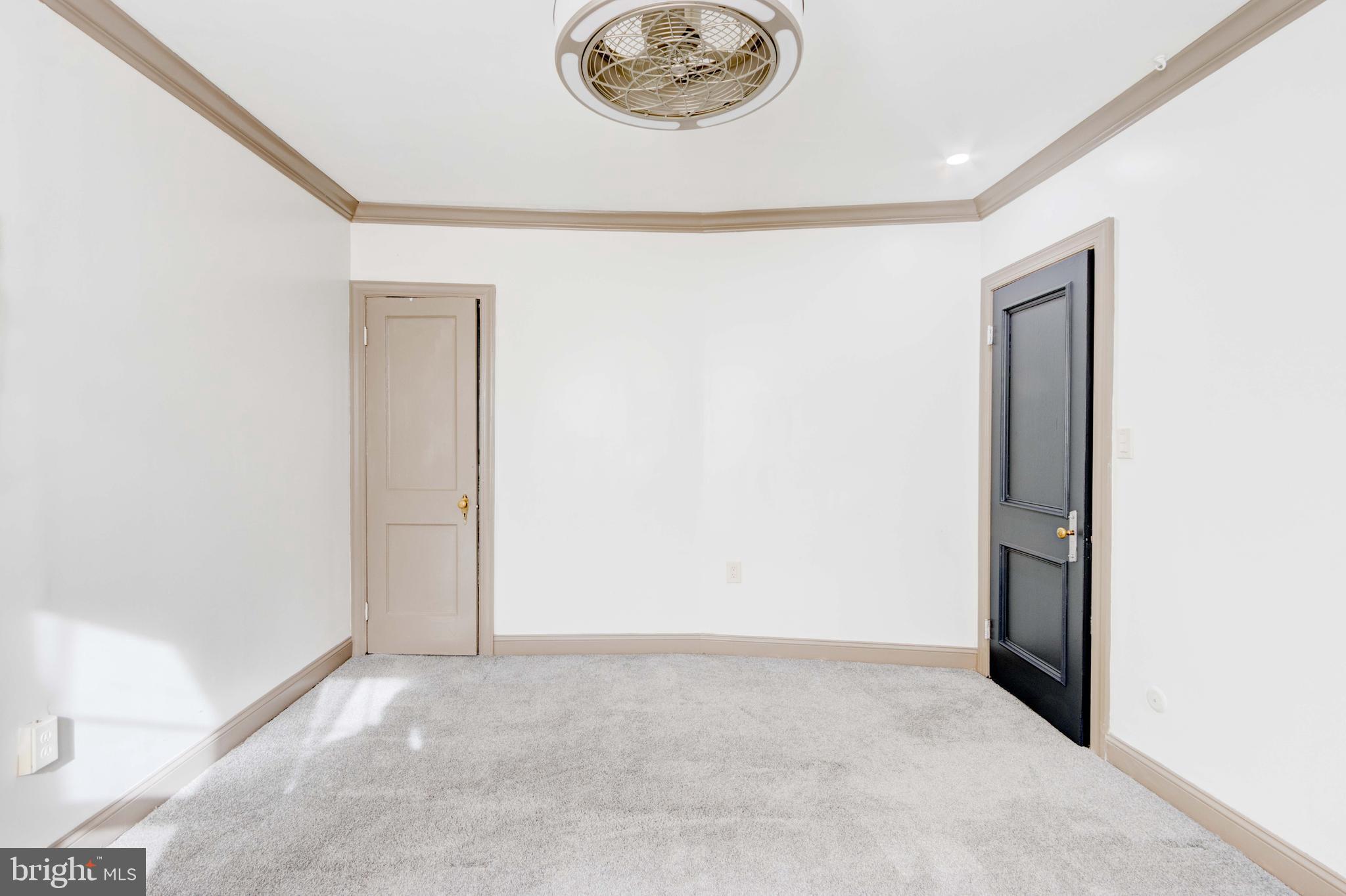 127 Cherrydell Road Catonsville, MD 21228 - Photo 10 of 24 a view of a room with a fan and a window