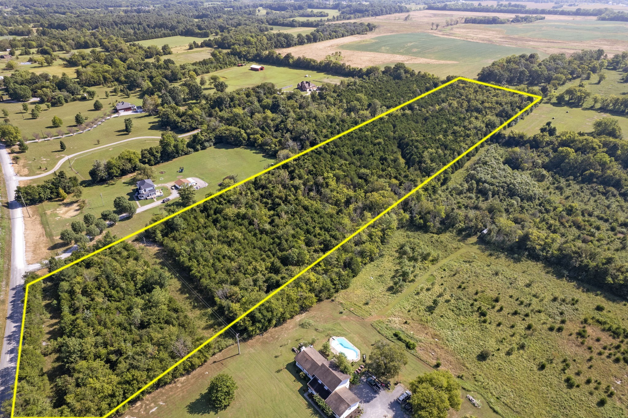 a view of a balcony with wooden floor
