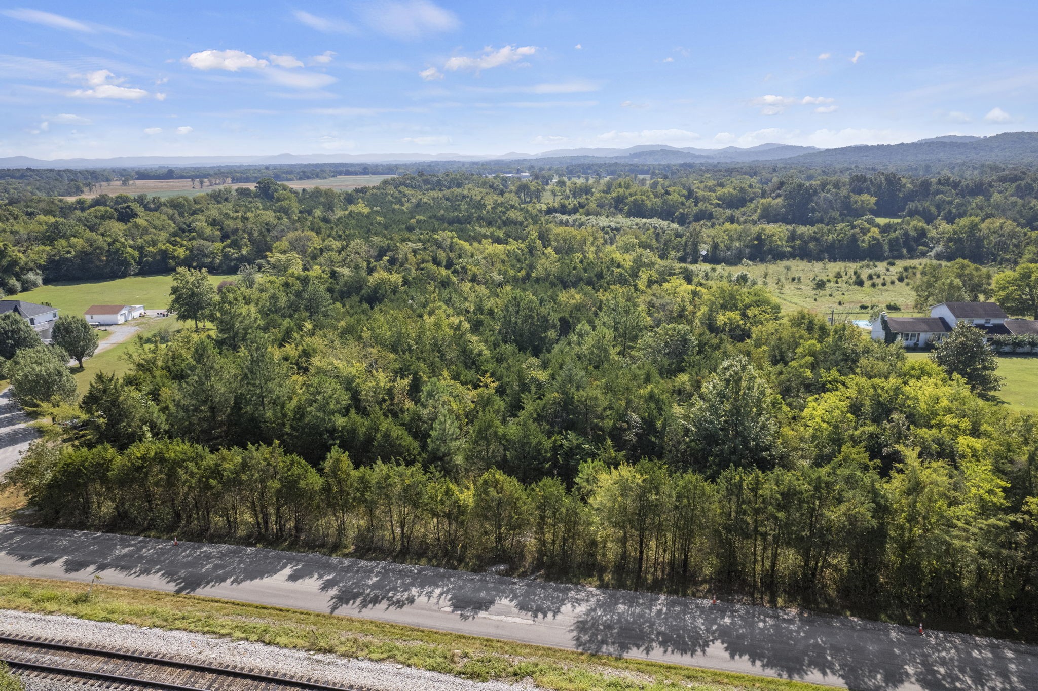 0 Christiana Fosterville Road Christiana, TN 37037 - Photo 10 of 15 a view of a green yard with an trees