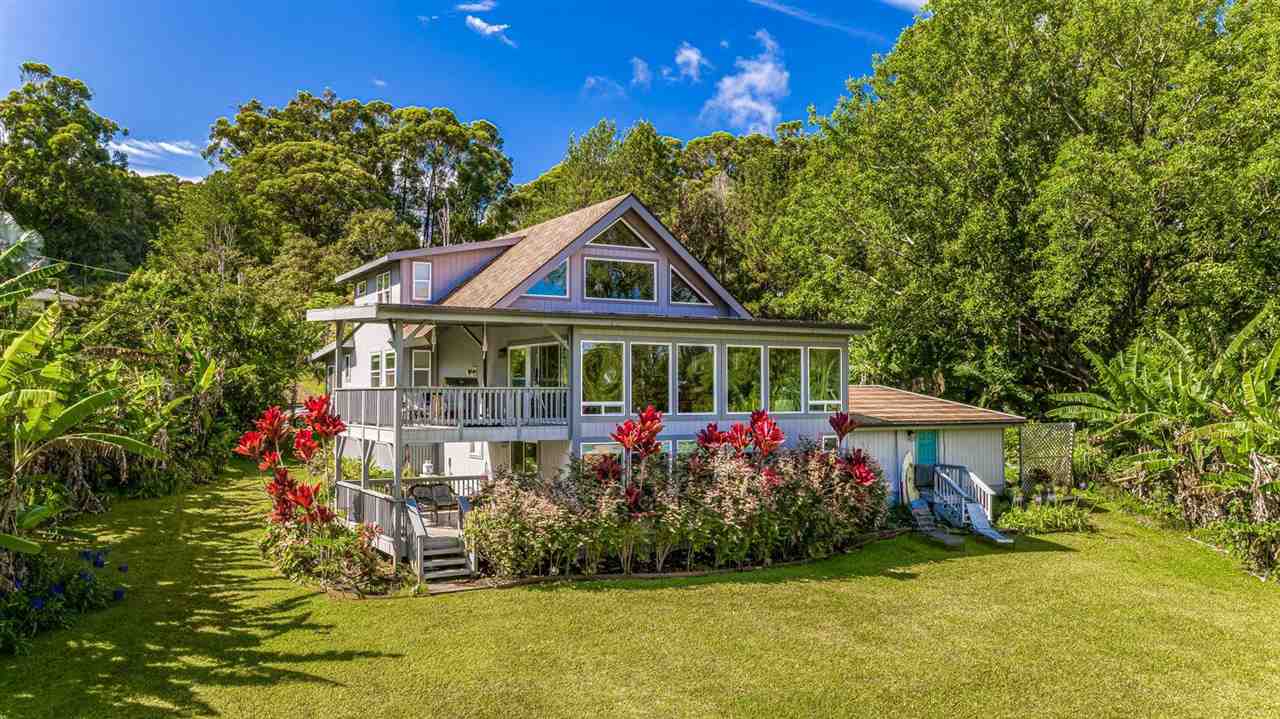 303 Waipalani Road Haiku, HI 96708 - Photo 22 of 29 a front view of a house with a yard