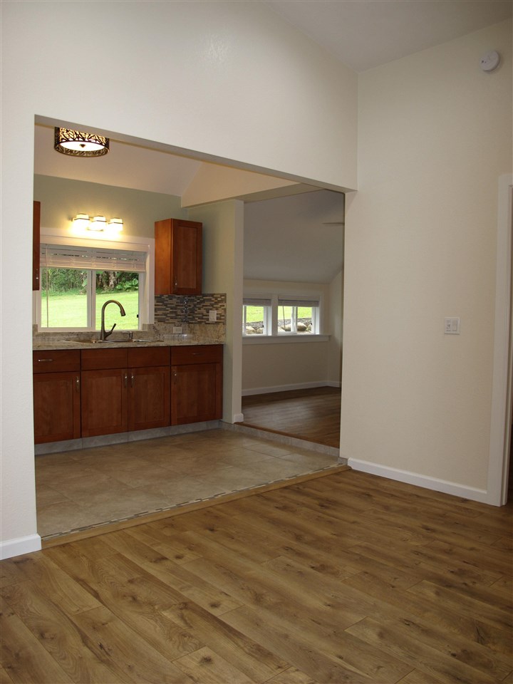 303 Waipalani Road Haiku, HI 96708 - Photo 29 of 29 an empty room with a kitchen and a sink