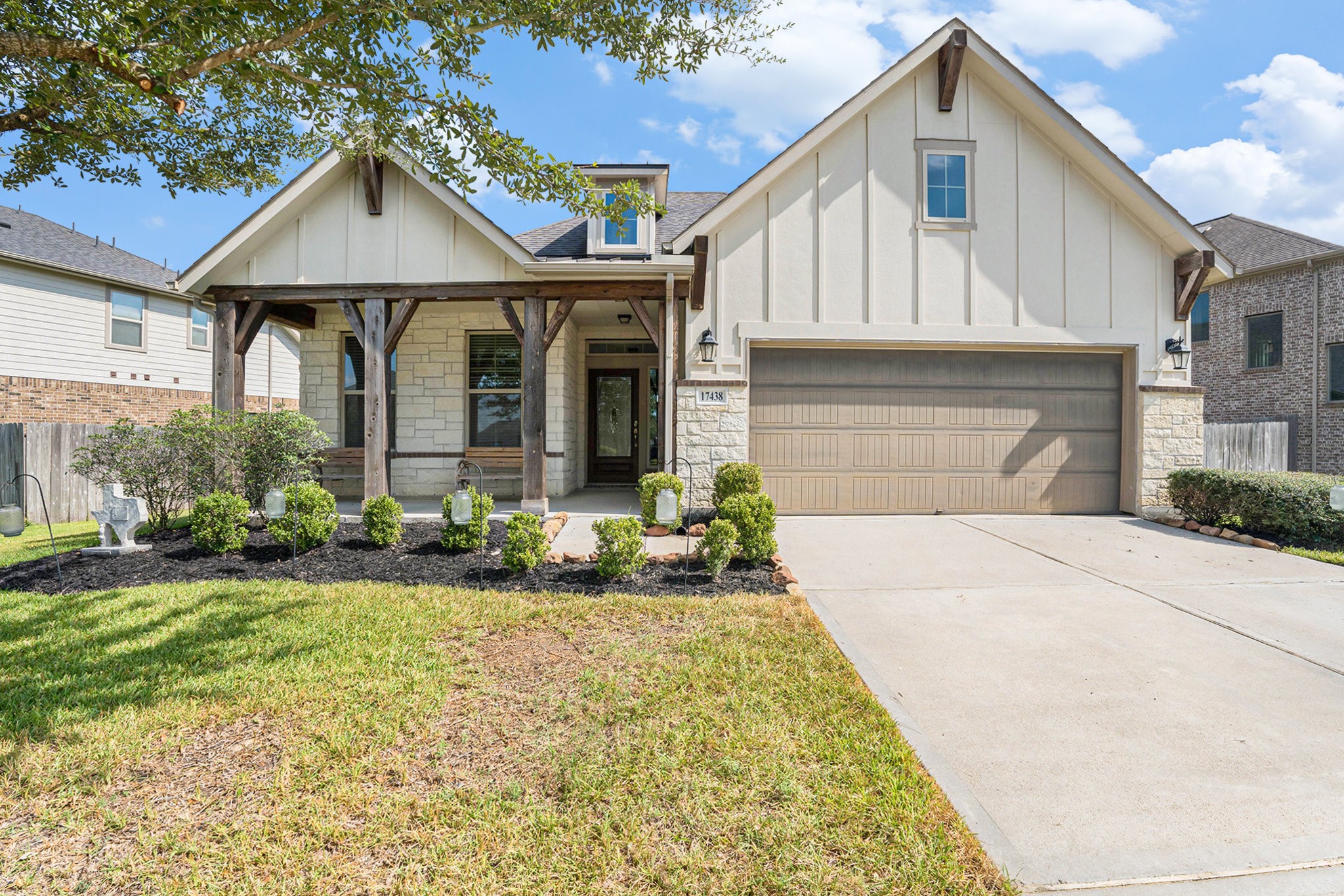 17438 Farm Pasture Trail Hockley, TX 77447 - Photo 1 of 25 a front view of a house with a yard and garage