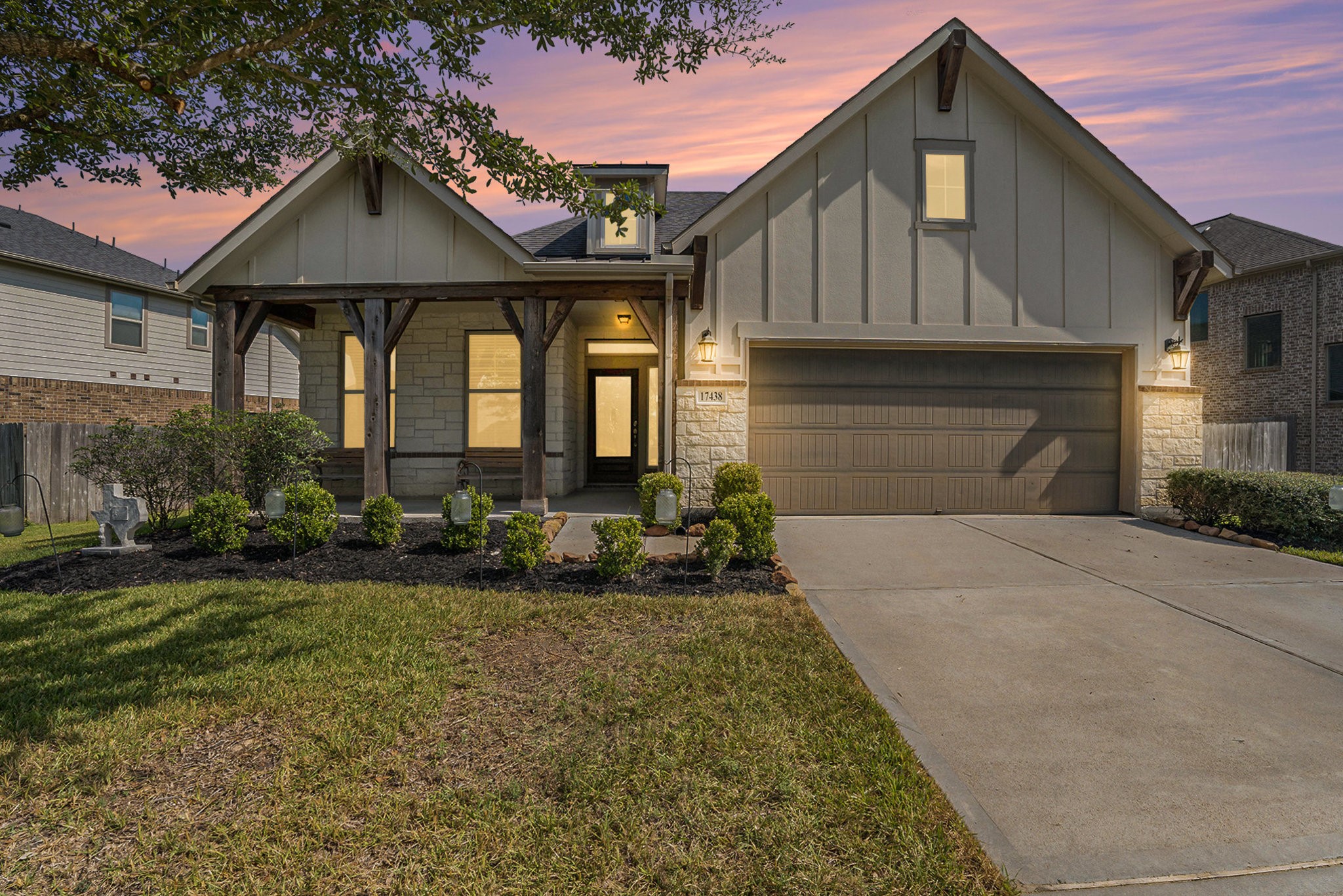17438 Farm Pasture Trail Hockley, TX 77447 - Photo 3 of 25 a front view of a house with a yard and garage