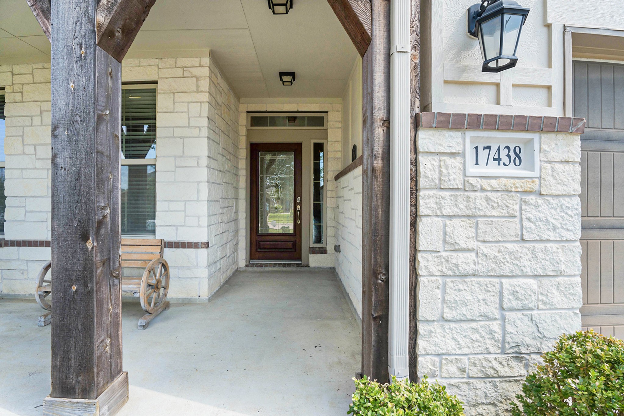 17438 Farm Pasture Trail Hockley, TX 77447 - Photo 4 of 25 a view of a brick house with a large windows