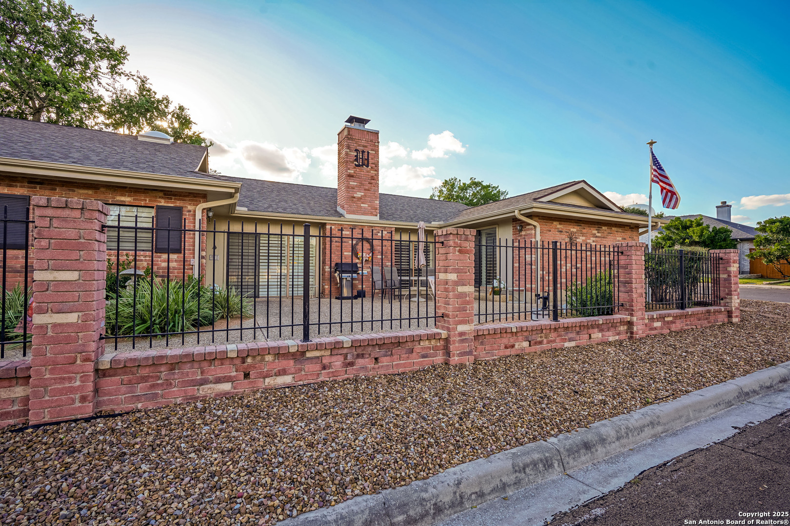 6118 Crescent Falls Windcrest, TX 78239 - Photo 12 of 60 a front view of a house with a garden