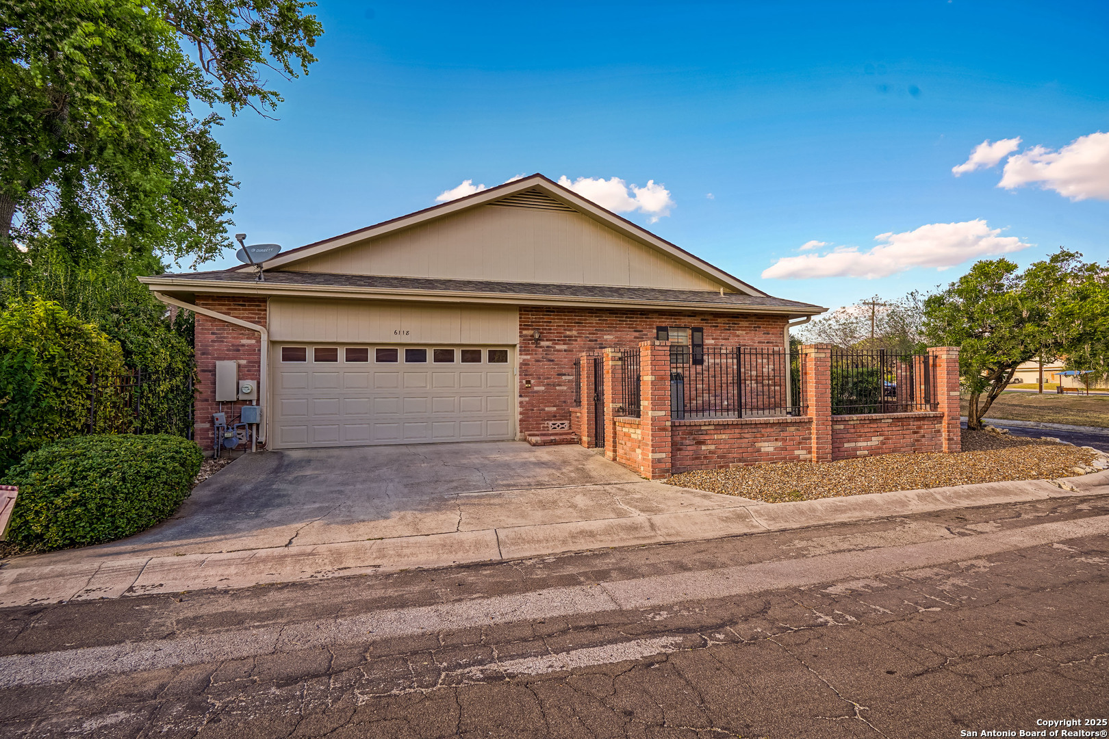 6118 Crescent Falls Windcrest, TX 78239 - Photo 13 of 60 a view of a house with a yard and garage