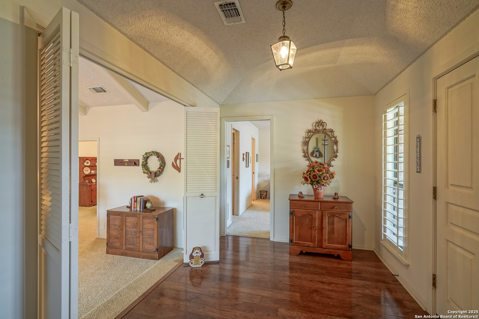 6118 Crescent Falls Windcrest, TX 78239 - Photo 16 of 60 a view of an entryway with wooden floor