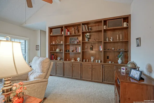 a kitchen with stainless steel appliances a sink stove refrigerator and cabinets
