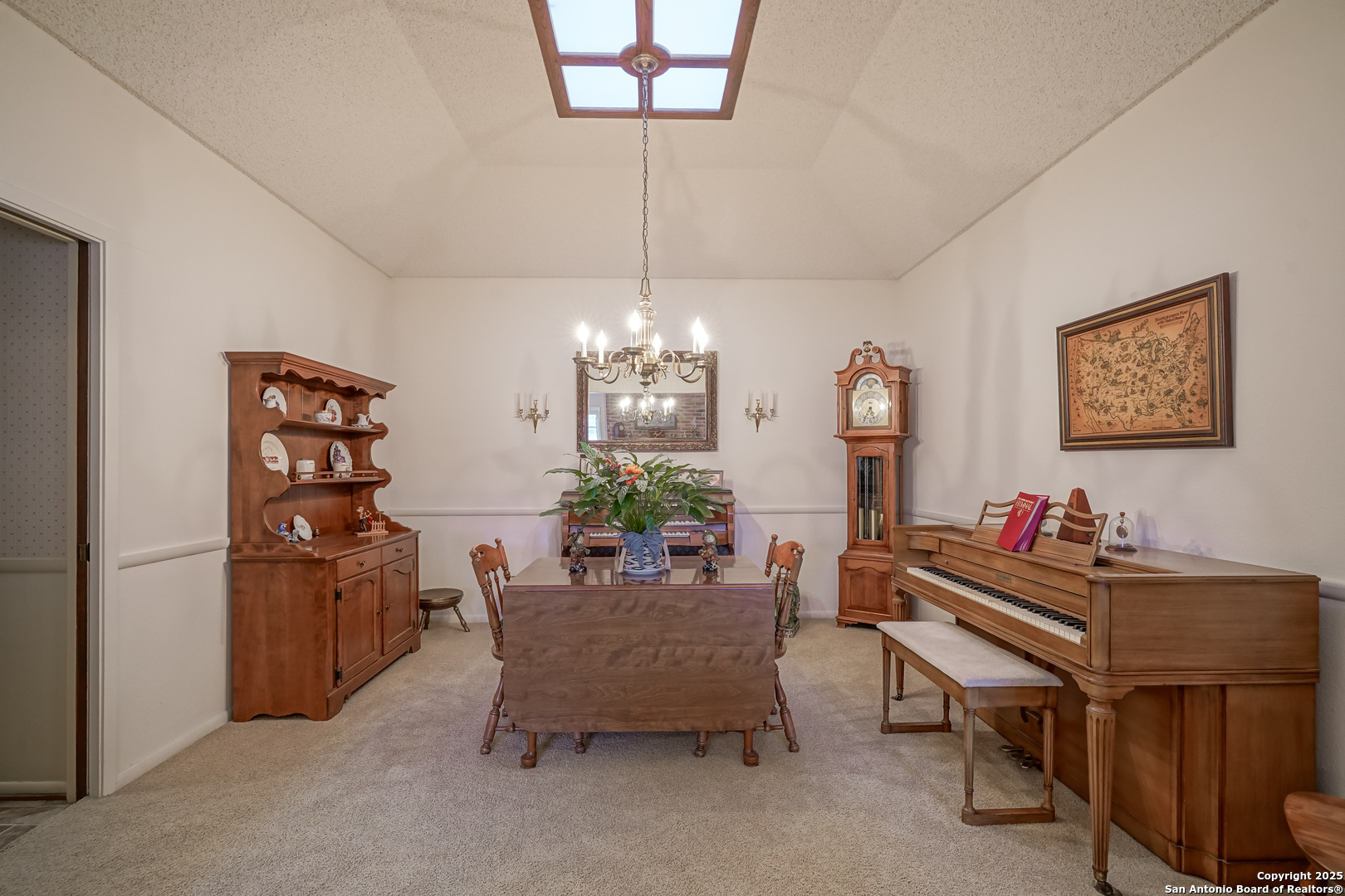 6118 Crescent Falls Windcrest, TX 78239 - Photo 32 of 60 a living room with furniture and a chandelier