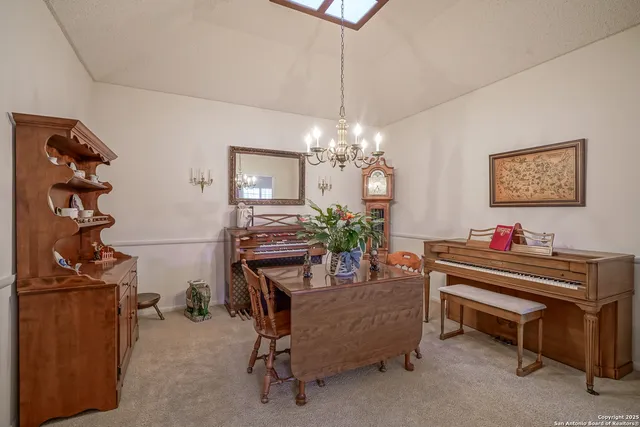 a kitchen with a sink cabinets and appliances