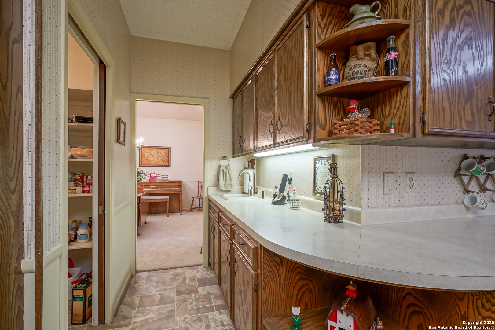 6118 Crescent Falls Windcrest, TX 78239 - Photo 37 of 60 a kitchen with stainless steel appliances a sink and a cabinets