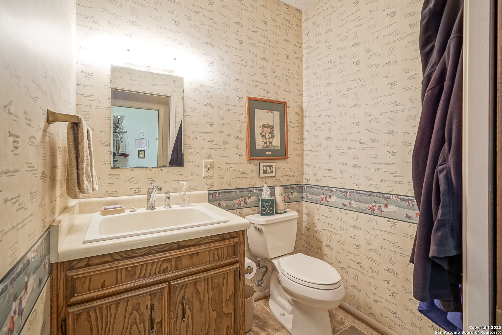 6118 Crescent Falls Windcrest, TX 78239 - Photo 44 of 60 a bathroom with a sink toilet and mirror